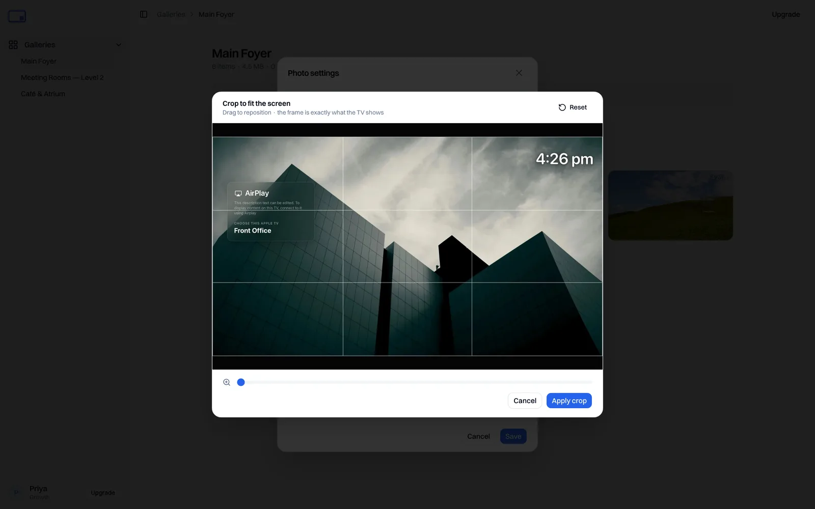 The crop editor, drag to reposition, use the slider to zoom